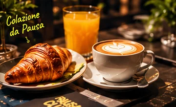 Colazione con cappuccino e cornetto